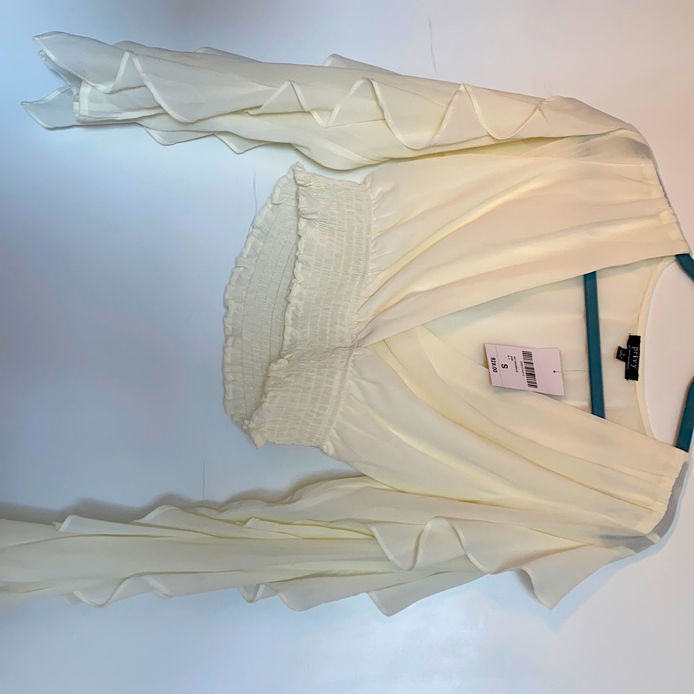 Beautiful shirt . Never worn with tags